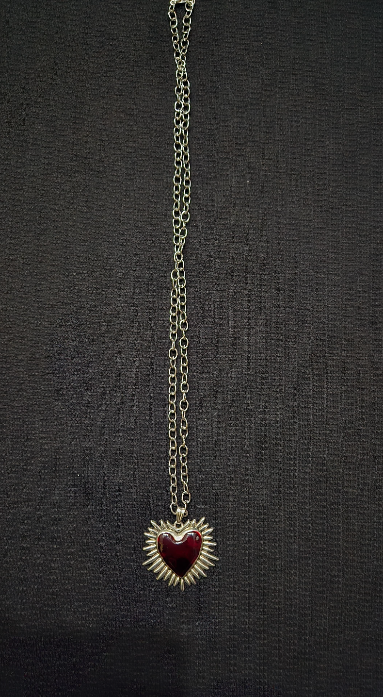 The Radiant Heart: Crimson Sunburst Gothic Pendant